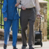 Oxlife Independence Oxygen Concentrator walking couple